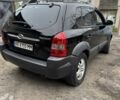 Чорний Хендай Туксон, об'ємом двигуна 2 л та пробігом 156 тис. км за 9200 $, фото 3 на Automoto.ua