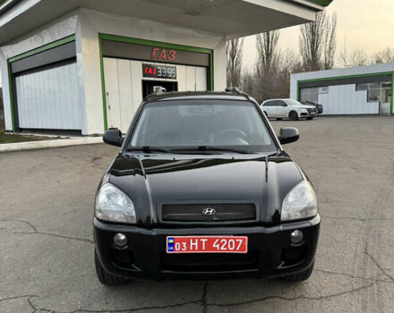 Черный Хендай Туксон, объемом двигателя 2 л и пробегом 210 тыс. км за 7850 $, фото 7 на Automoto.ua