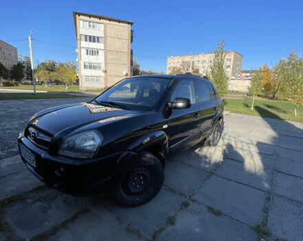 Черный Хендай Туксон, объемом двигателя 1.98 л и пробегом 262 тыс. км за 7900 $, фото 3 на Automoto.ua