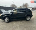 Чорний Хендай Туксон, об'ємом двигуна 2 л та пробігом 243 тис. км за 7999 $, фото 9 на Automoto.ua