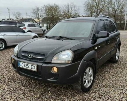 Чорний Хендай Туксон, об'ємом двигуна 2 л та пробігом 185 тис. км за 7499 $, фото 14 на Automoto.ua