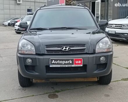 Черный Хендай Туксон, объемом двигателя 2 л и пробегом 214 тыс. км за 7690 $, фото 1 на Automoto.ua