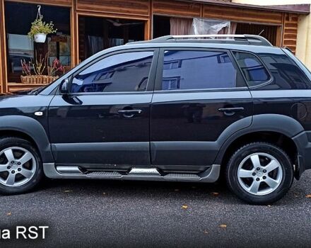 Чорний Хендай Туксон, об'ємом двигуна 2 л та пробігом 188 тис. км за 8800 $, фото 1 на Automoto.ua