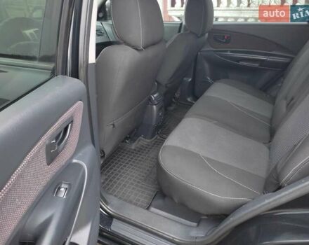 Черный Хендай Туксон, объемом двигателя 2 л и пробегом 237 тыс. км за 7500 $, фото 17 на Automoto.ua