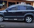 Чорний Хендай Туксон, об'ємом двигуна 2 л та пробігом 188 тис. км за 8800 $, фото 1 на Automoto.ua