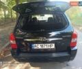 Чорний Хендай Туксон, об'ємом двигуна 1.98 л та пробігом 230 тис. км за 6950 $, фото 3 на Automoto.ua