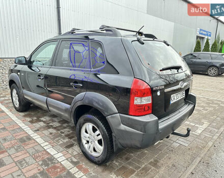 Чорний Хендай Туксон, об'ємом двигуна 2.66 л та пробігом 395 тис. км за 9950 $, фото 6 на Automoto.ua