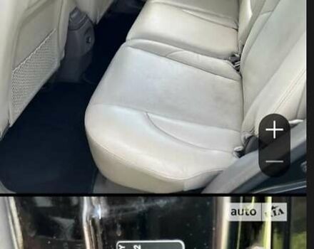 Черный Хендай Туксон, объемом двигателя 1.98 л и пробегом 300 тыс. км за 6800 $, фото 1 на Automoto.ua