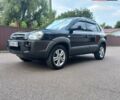 Черный Хендай Туксон, объемом двигателя 2 л и пробегом 168 тыс. км за 9000 $, фото 1 на Automoto.ua