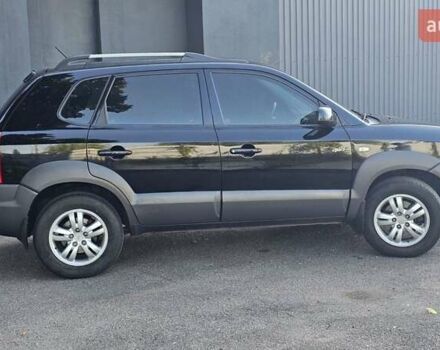 Чорний Хендай Туксон, об'ємом двигуна 1.98 л та пробігом 215 тис. км за 8350 $, фото 11 на Automoto.ua