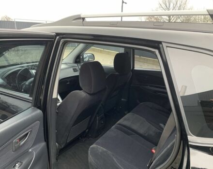 Черный Хендай Туксон, объемом двигателя 2 л и пробегом 198 тыс. км за 7500 $, фото 6 на Automoto.ua