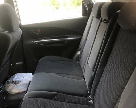 Черный Хендай Туксон, объемом двигателя 1.98 л и пробегом 256 тыс. км за 8200 $, фото 7 на Automoto.ua