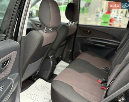 Черный Хендай Туксон, объемом двигателя 1.98 л и пробегом 239 тыс. км за 8700 $, фото 11 на Automoto.ua