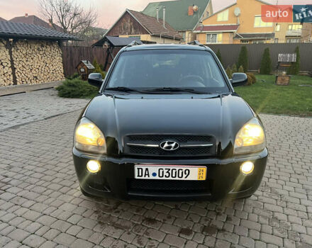 Черный Хендай Туксон, объемом двигателя 2 л и пробегом 276 тыс. км за 7450 $, фото 8 на Automoto.ua