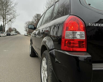 Черный Хендай Туксон, объемом двигателя 2 л и пробегом 136 тыс. км за 8500 $, фото 7 на Automoto.ua