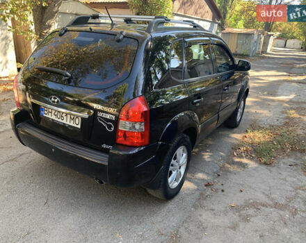 Черный Хендай Туксон, объемом двигателя 1.98 л и пробегом 260 тыс. км за 7777 $, фото 5 на Automoto.ua