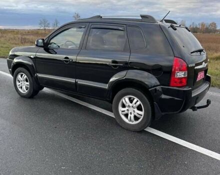 Черный Хендай Туксон, объемом двигателя 2 л и пробегом 253 тыс. км за 8299 $, фото 19 на Automoto.ua