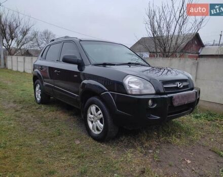 Черный Хендай Туксон, объемом двигателя 2 л и пробегом 237 тыс. км за 7500 $, фото 8 на Automoto.ua