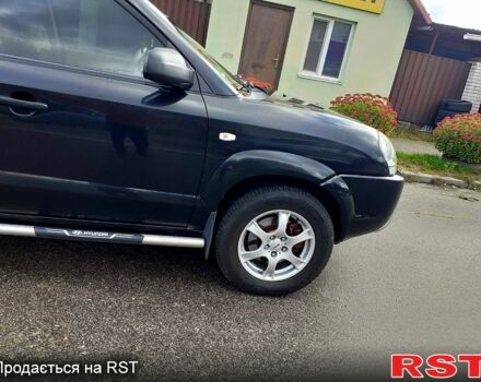 Черный Хендай Туксон, объемом двигателя 2 л и пробегом 240 тыс. км за 7500 $, фото 8 на Automoto.ua