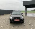 Черный Хендай Туксон, объемом двигателя 2 л и пробегом 198 тыс. км за 7500 $, фото 4 на Automoto.ua