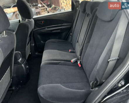 Черный Хендай Туксон, объемом двигателя 2 л и пробегом 276 тыс. км за 7450 $, фото 26 на Automoto.ua
