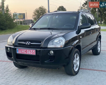Черный Хендай Туксон, объемом двигателя 2 л и пробегом 250 тыс. км за 7950 $, фото 3 на Automoto.ua