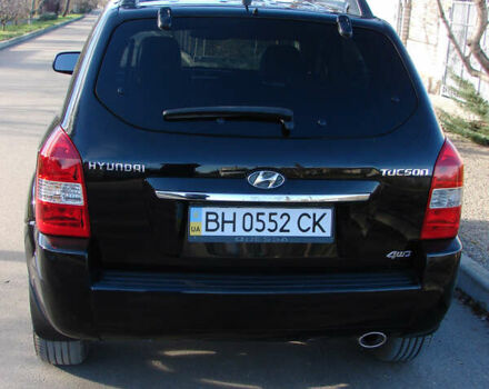 Черный Хендай Туксон, объемом двигателя 2 л и пробегом 162 тыс. км за 8200 $, фото 5 на Automoto.ua