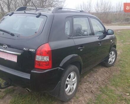 Черный Хендай Туксон, объемом двигателя 2 л и пробегом 198 тыс. км за 8200 $, фото 8 на Automoto.ua