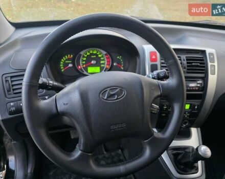 Хендай Туксон 2009 в Гусятине на Automoto.ua Черный Хендай Туксон, объемом двигателя 2 л и пробегом 143 тыс. км за 9700 $, фото 46 на Automoto.ua