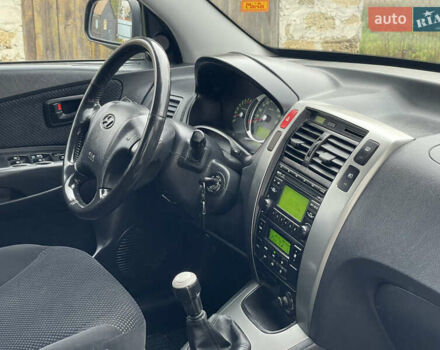 Чорний Хендай Туксон, об'ємом двигуна 2 л та пробігом 200 тис. км за 8450 $, фото 29 на Automoto.ua