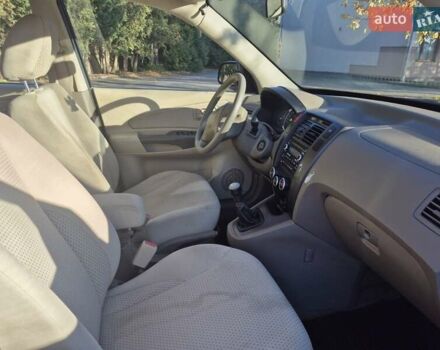 Чорний Хендай Туксон, об'ємом двигуна 2 л та пробігом 187 тис. км за 7900 $, фото 7 на Automoto.ua