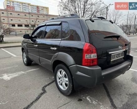Черный Хендай Туксон, объемом двигателя 2 л и пробегом 282 тыс. км за 8700 $, фото 14 на Automoto.ua