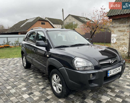 Чорний Хендай Туксон, об'ємом двигуна 2 л та пробігом 200 тис. км за 8450 $, фото 3 на Automoto.ua