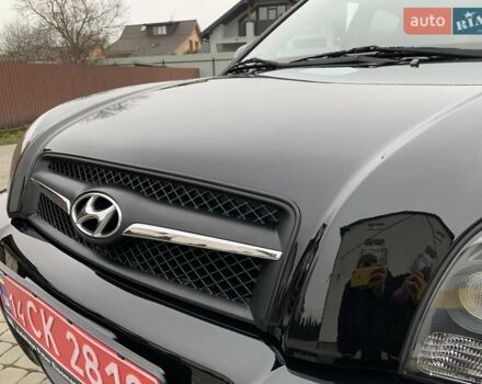 Черный Хендай Туксон, объемом двигателя 2 л и пробегом 114 тыс. км за 8850 $, фото 14 на Automoto.ua