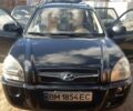 Чорний Хендай Туксон, об'ємом двигуна 2 л та пробігом 176 тис. км за 8200 $, фото 1 на Automoto.ua
