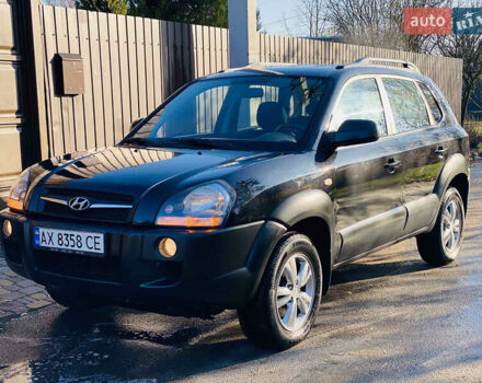 Черный Хендай Туксон, объемом двигателя 1.99 л и пробегом 95 тыс. км за 8500 $, фото 27 на Automoto.ua