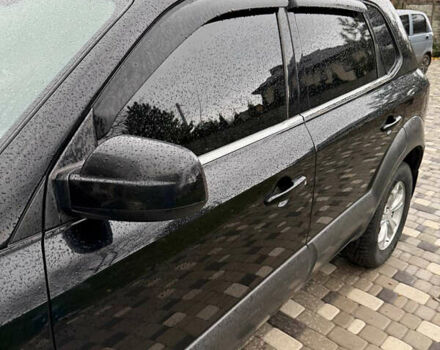 Черный Хендай Туксон, объемом двигателя 2.66 л и пробегом 205 тыс. км за 10000 $, фото 44 на Automoto.ua