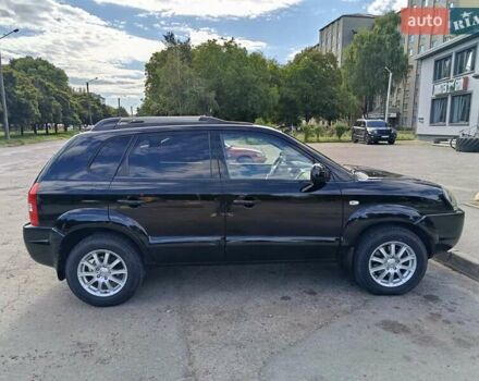 Чорний Хендай Туксон, об'ємом двигуна 1.98 л та пробігом 242 тис. км за 8900 $, фото 5 на Automoto.ua