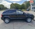 Чорний Хендай Туксон, об'ємом двигуна 1.98 л та пробігом 242 тис. км за 8900 $, фото 5 на Automoto.ua