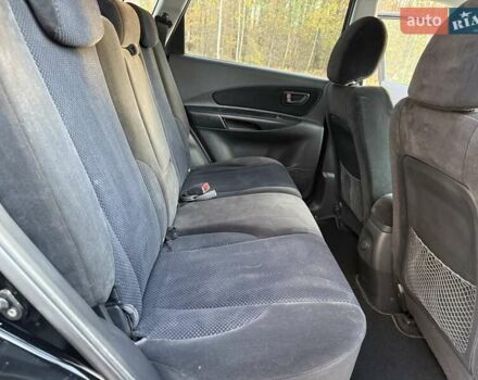 Черный Хендай Туксон, объемом двигателя 2 л и пробегом 148 тыс. км за 8700 $, фото 20 на Automoto.ua