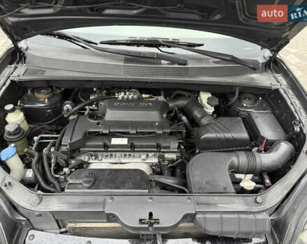 Черный Хендай Туксон, объемом двигателя 2 л и пробегом 191 тыс. км за 8500 $, фото 49 на Automoto.ua