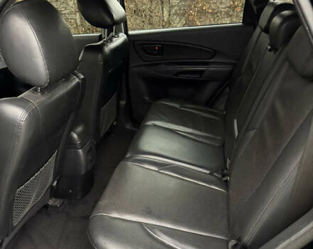 Черный Хендай Туксон, объемом двигателя 2.66 л и пробегом 205 тыс. км за 10000 $, фото 60 на Automoto.ua