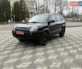 Черный Хендай Туксон, объемом двигателя 2 л и пробегом 191 тыс. км за 8500 $, фото 1 на Automoto.ua