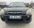 Черный Хендай Туксон, объемом двигателя 2 л и пробегом 168 тыс. км за 7500 $, фото 2 на Automoto.ua