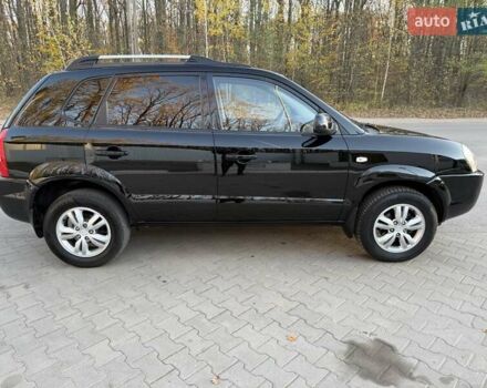 Черный Хендай Туксон, объемом двигателя 2 л и пробегом 148 тыс. км за 8700 $, фото 4 на Automoto.ua