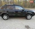 Черный Хендай Туксон, объемом двигателя 2 л и пробегом 148 тыс. км за 8700 $, фото 4 на Automoto.ua