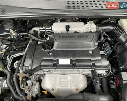 Чорний Хендай Туксон, об'ємом двигуна 2 л та пробігом 200 тис. км за 8450 $, фото 40 на Automoto.ua