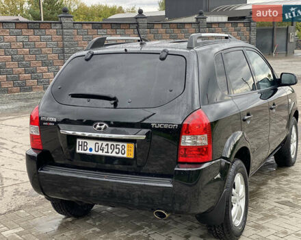 Черный Хендай Туксон, объемом двигателя 2 л и пробегом 191 тыс. км за 7800 $, фото 9 на Automoto.ua