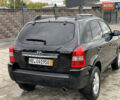 Черный Хендай Туксон, объемом двигателя 2 л и пробегом 191 тыс. км за 7800 $, фото 9 на Automoto.ua