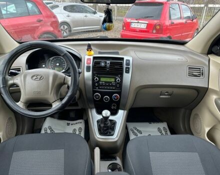 Черный Хендай Туксон, объемом двигателя 2 л и пробегом 166 тыс. км за 7500 $, фото 7 на Automoto.ua